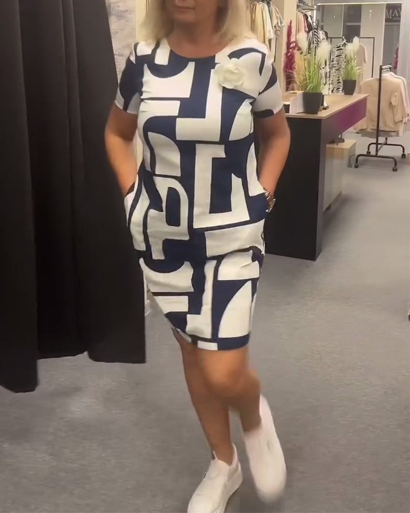 Geometriskt tryck fickklänning med rund hals