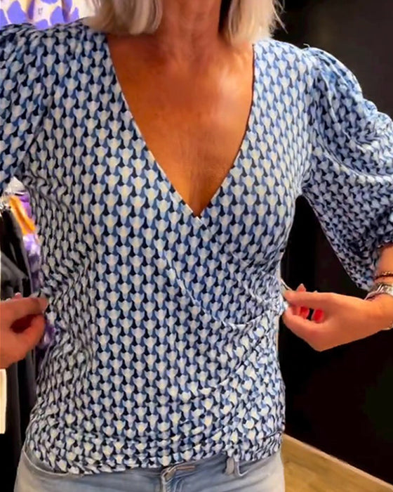 Långärmad topp med djup V-ringning