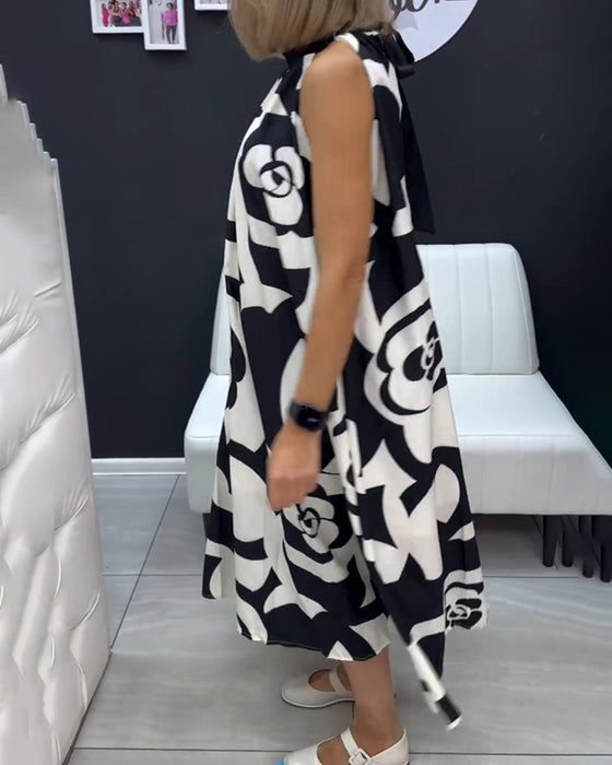 Ärmlös elegant tryckt klänning