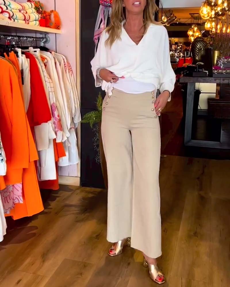 Knytblus i enfärgad V-ringning