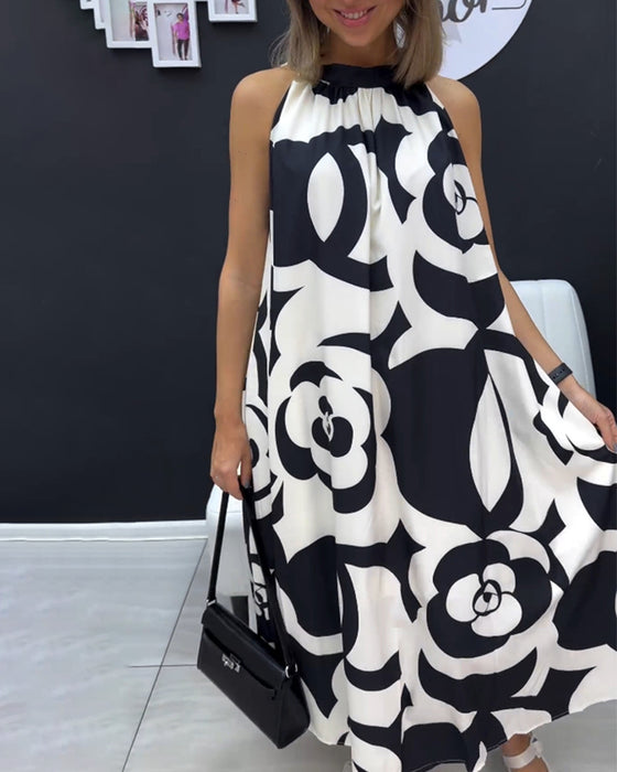 Ärmlös elegant tryckt klänning