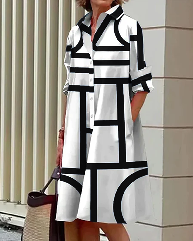 Klänning med fickor och geometriskt tryck