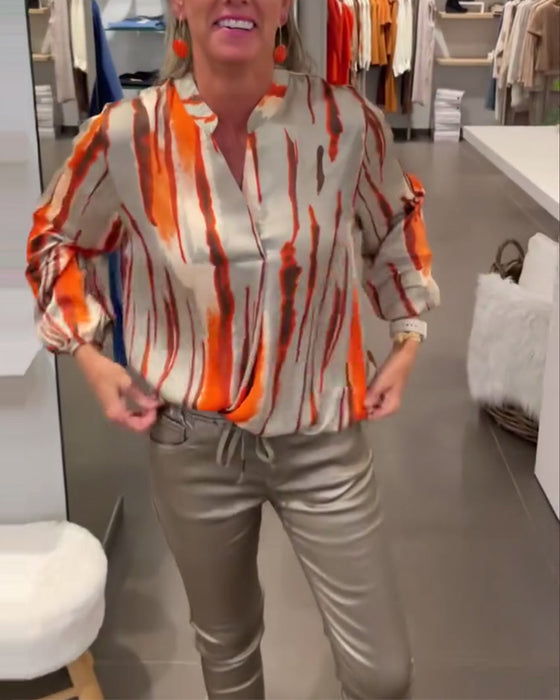 Långärmad blus med randigt tryck