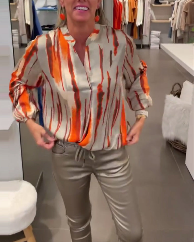 Långärmad blus med randigt tryck