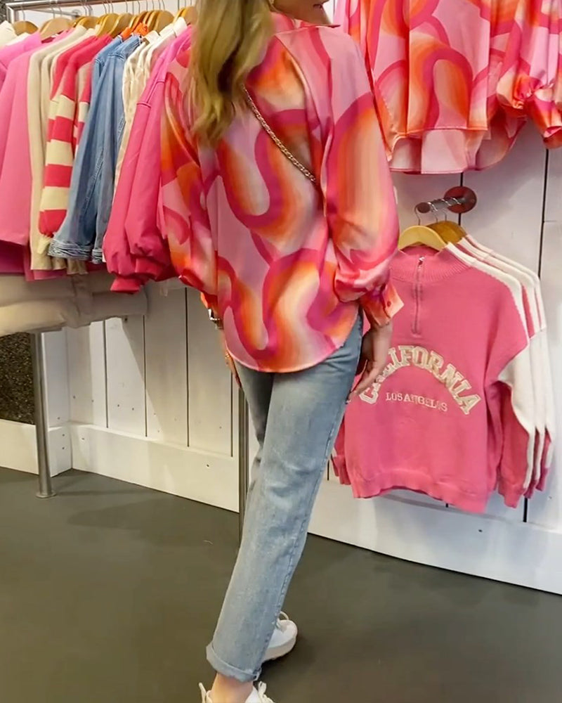 Blus med kavajslag och lång ärm