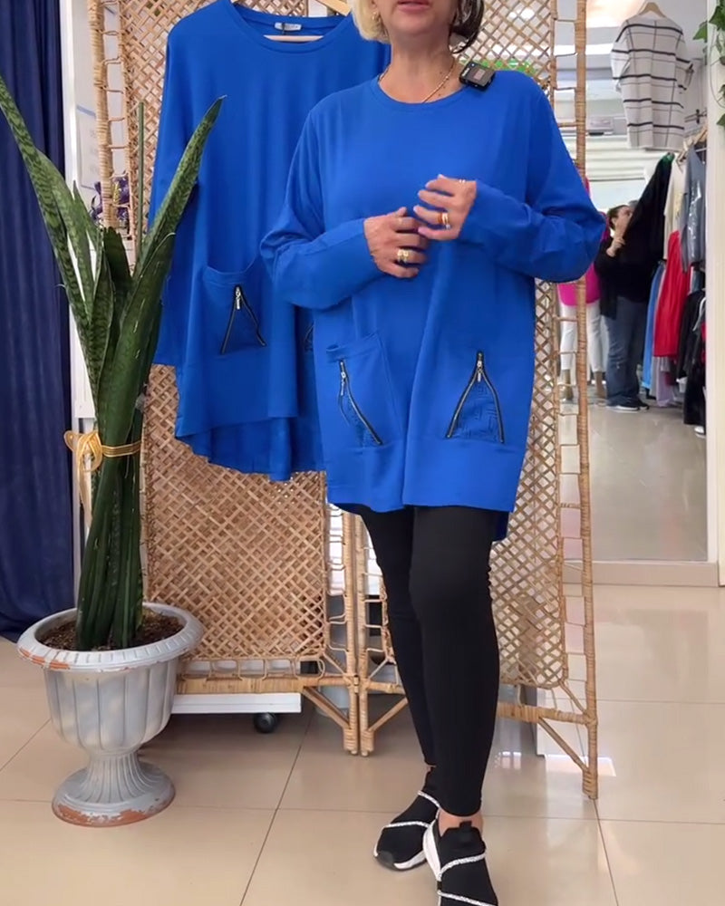 Enfärgad dragkedja i enfärgad tröja med rund hals