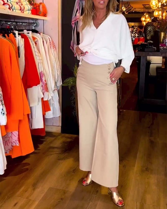 Knytblus i enfärgad V-ringning