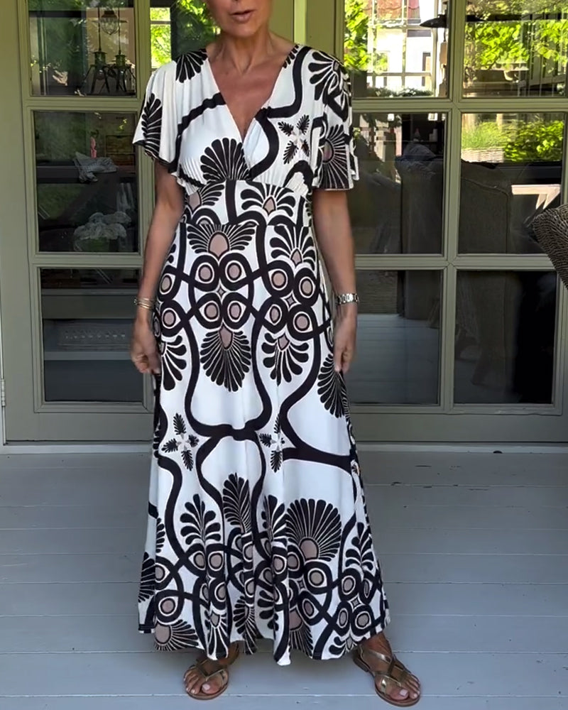 Kortärmad klänning med vintagetryck