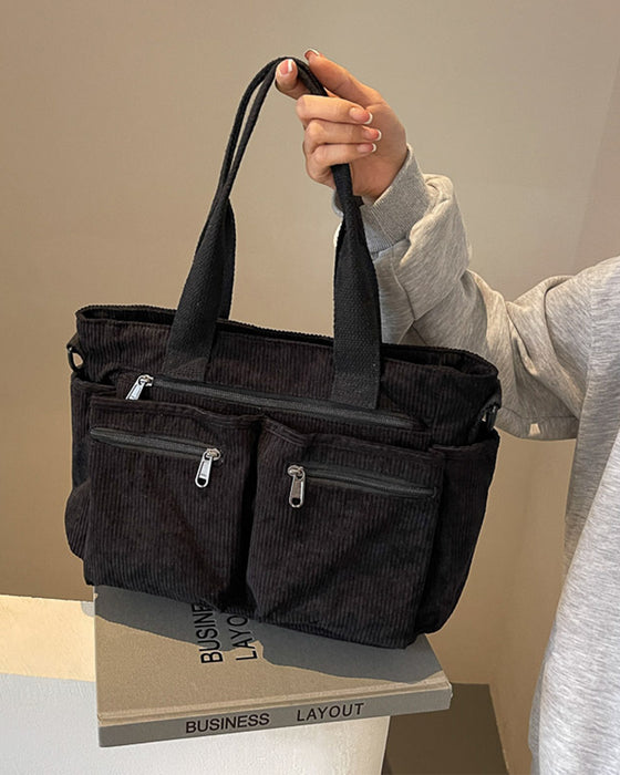 Enfärgad manchesterväska