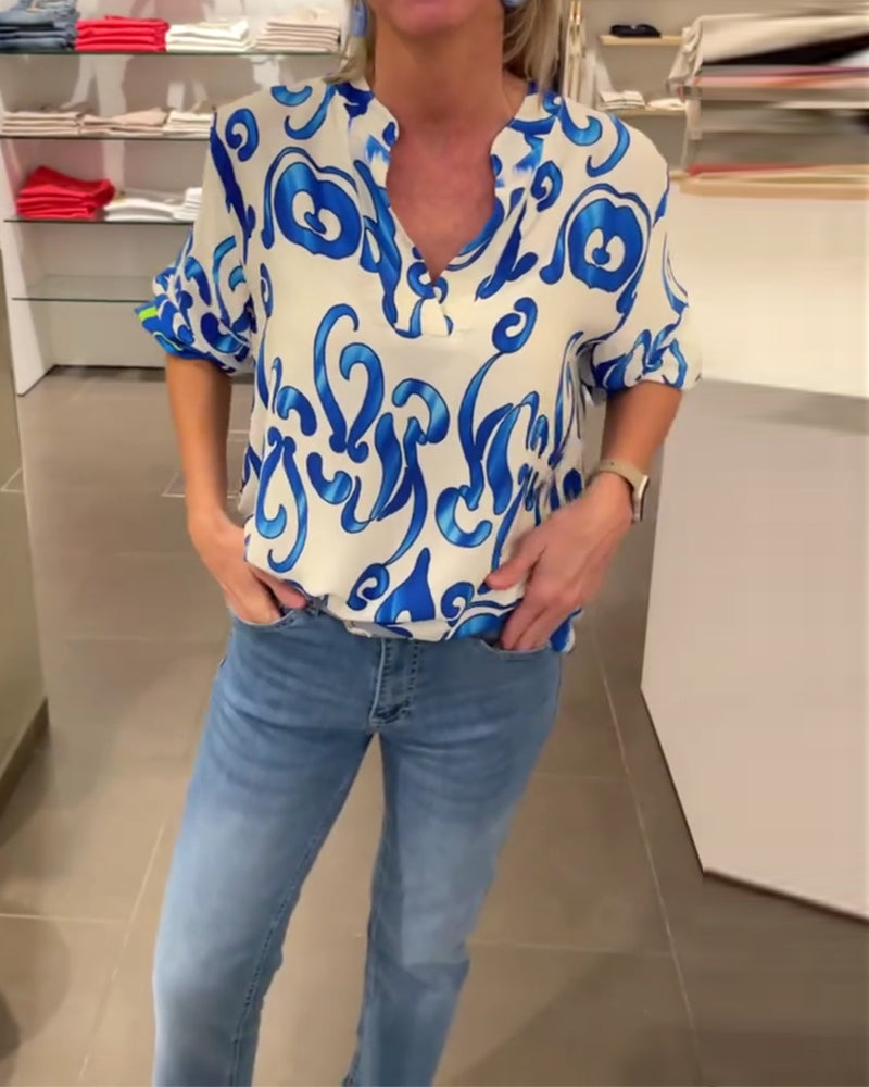 Elegant långärmad topp med tryckt V-ringning