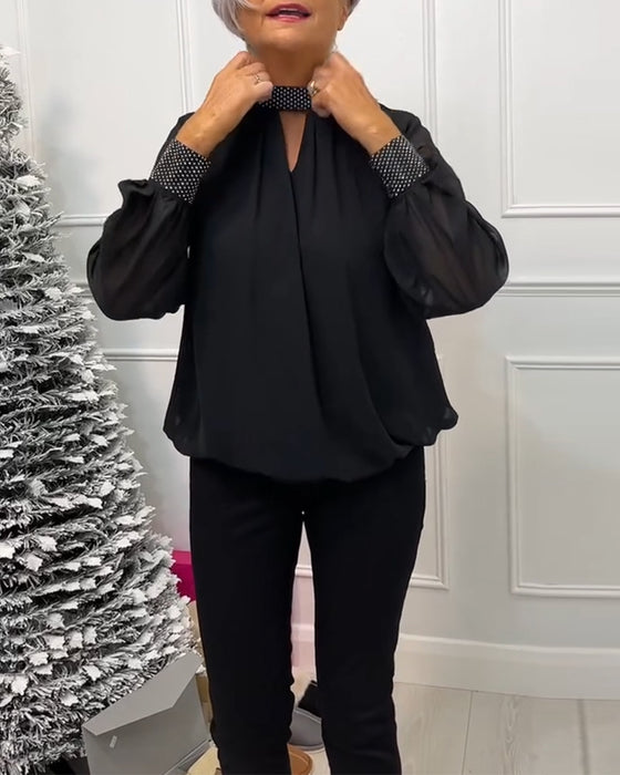 Moderiktig enfärgad blus med stativ krage patchwork och ihålig