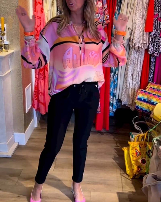 Casual topp med fjädring i kontrasttryck