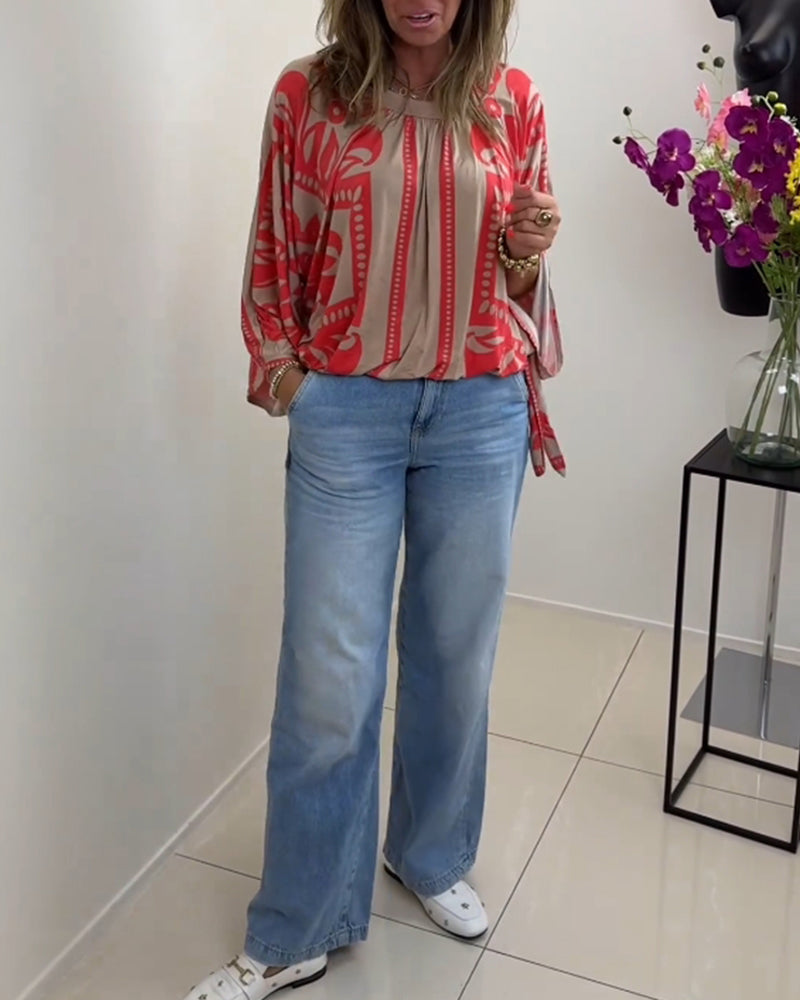 Långärmad avslappnad topp med rund hals med tryck