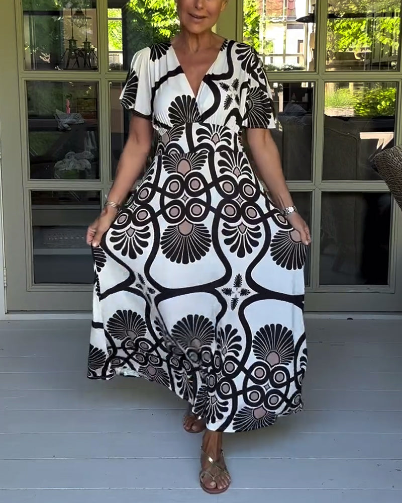 Kortärmad klänning med vintagetryck
