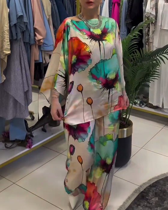 Lotustryckset med en axel och trekvartsärm