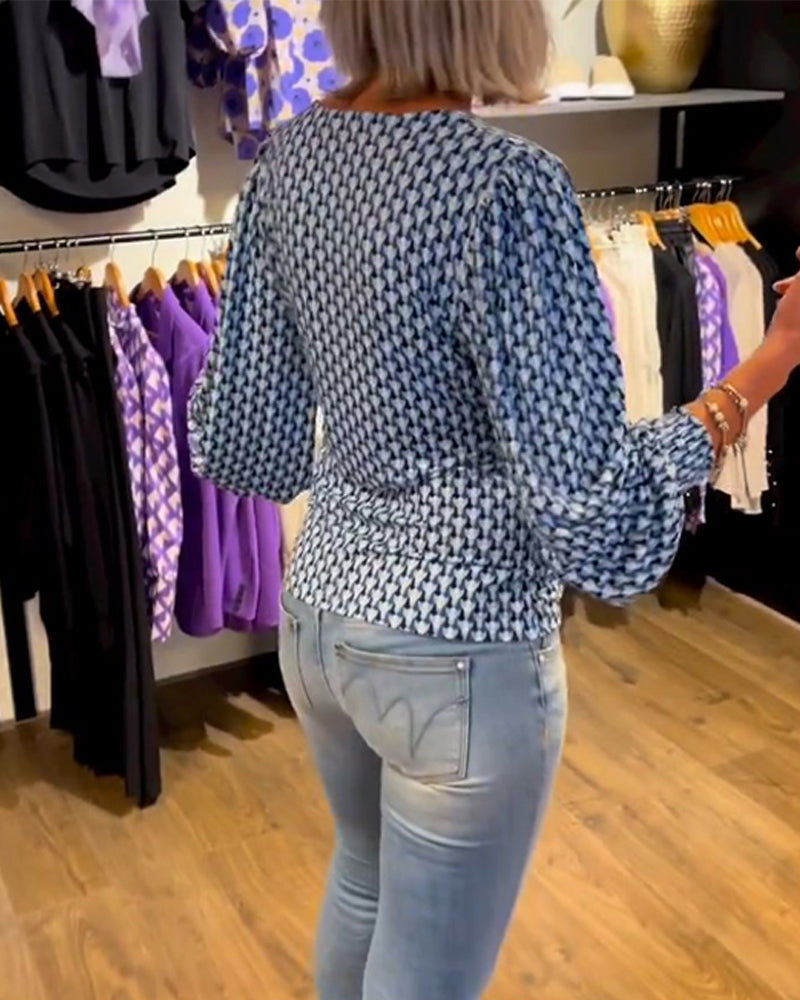 Långärmad topp med djup V-ringning