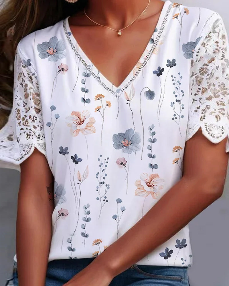 Blus med lace-patch och tryck
