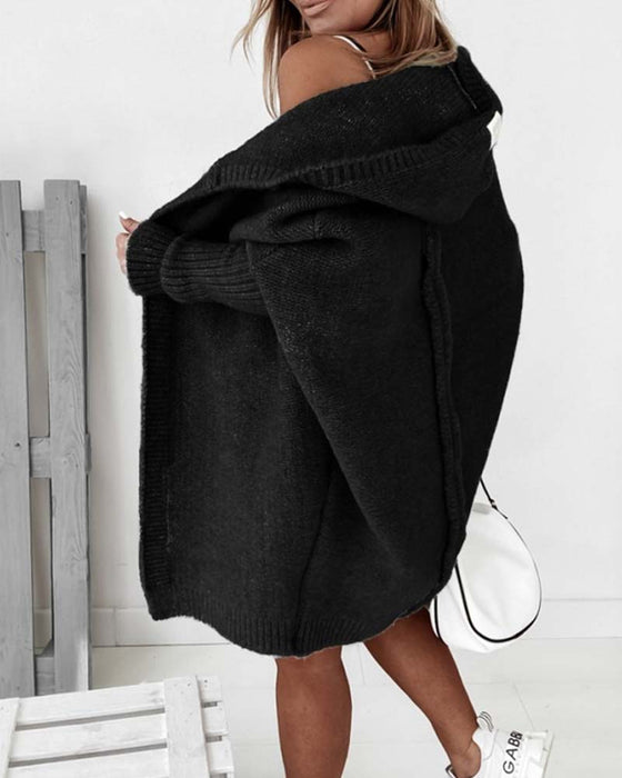 Enkel kofta med fladdermushuva i enfärgad färg