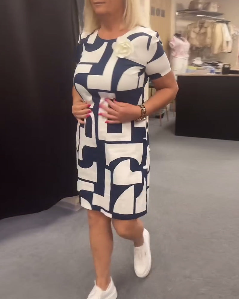 Geometriskt tryck fickklänning med rund hals