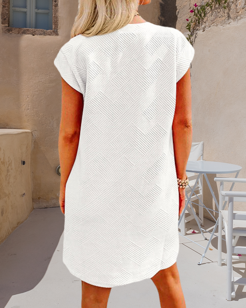 Kortärmad klänning med rund halsficka