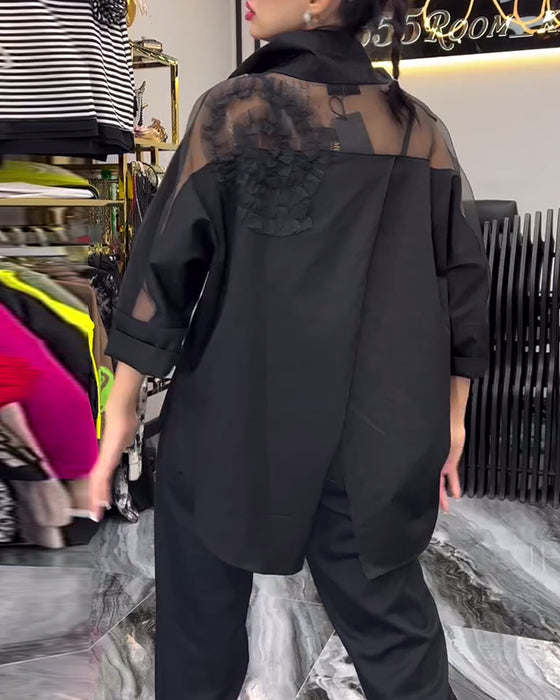 Lapelblom i spets med lapptäcke