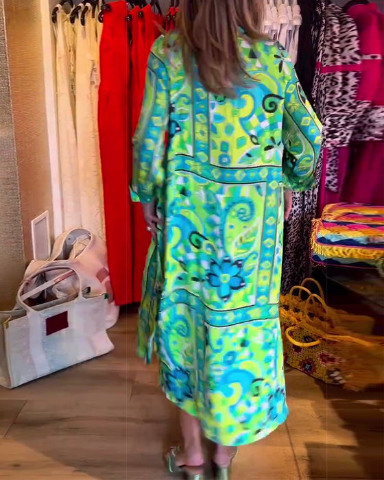 Klänningar med lös passform och tryck och fickor