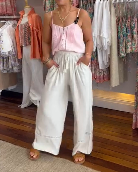 Enfärgade bekväma byxor med vida ben med fickor