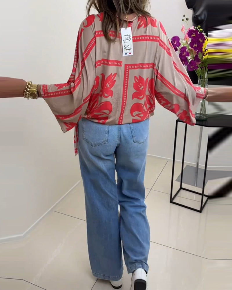 Långärmad avslappnad topp med rund hals med tryck