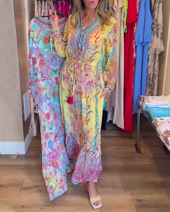 Långärmad resortklänning med tryck