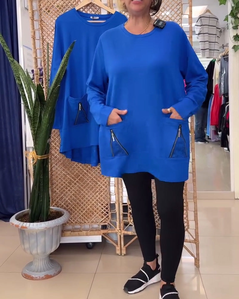 Enfärgad dragkedja i enfärgad tröja med rund hals