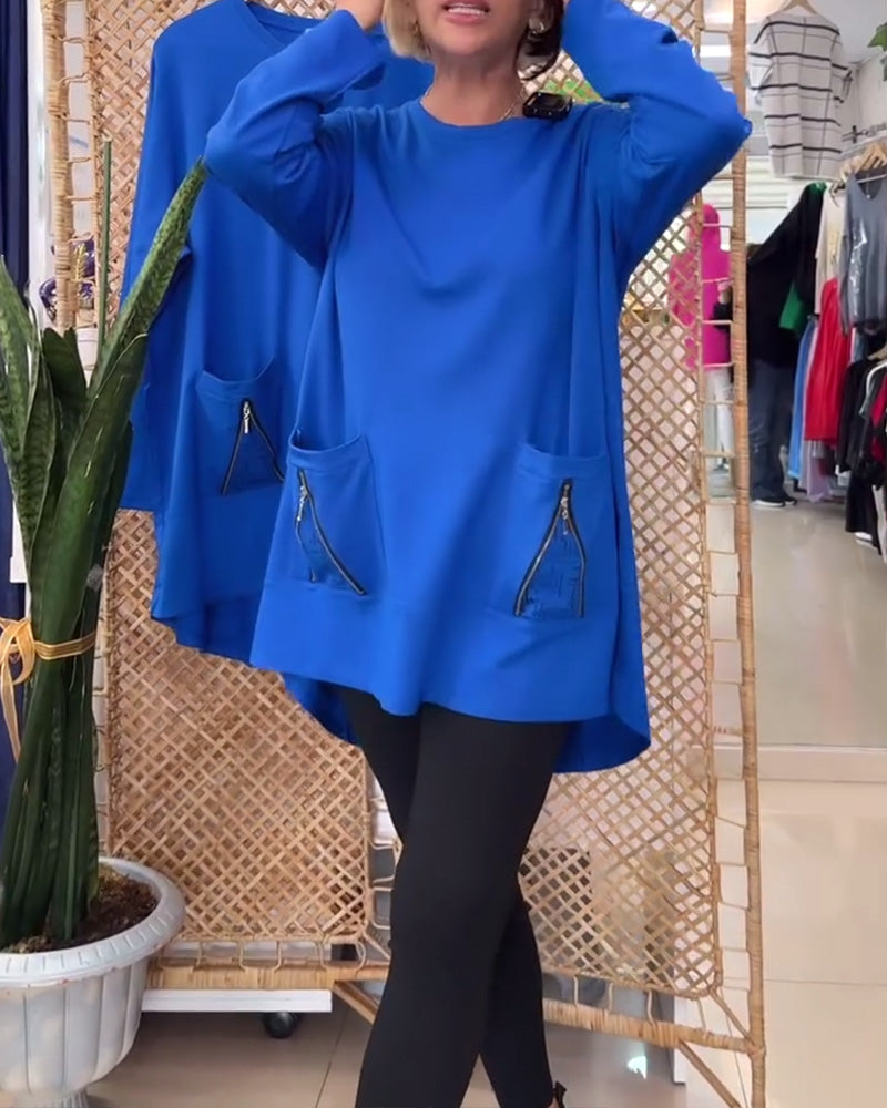 Enfärgad dragkedja i enfärgad tröja med rund hals