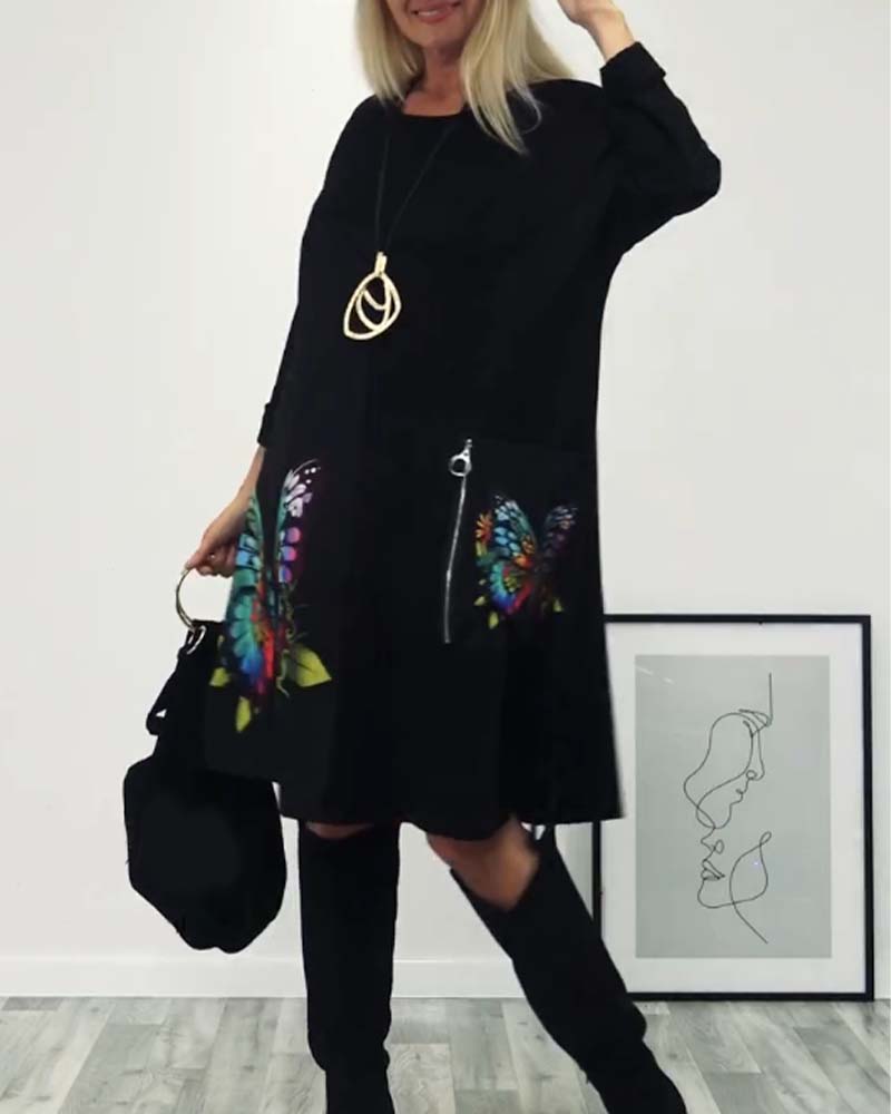 Fjärilstryck långärmad klänning i ficka