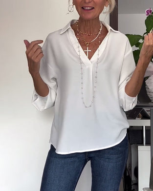 Enkel enfärgad topp med lapel och lång ärm