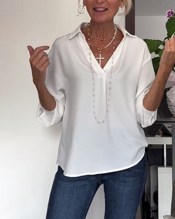 Enkel enfärgad topp med lapel och lång ärm