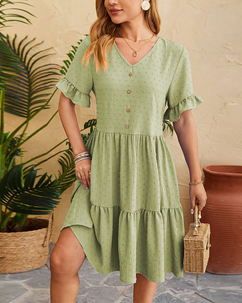 Elegant volangklänning med knäppning i A-linje