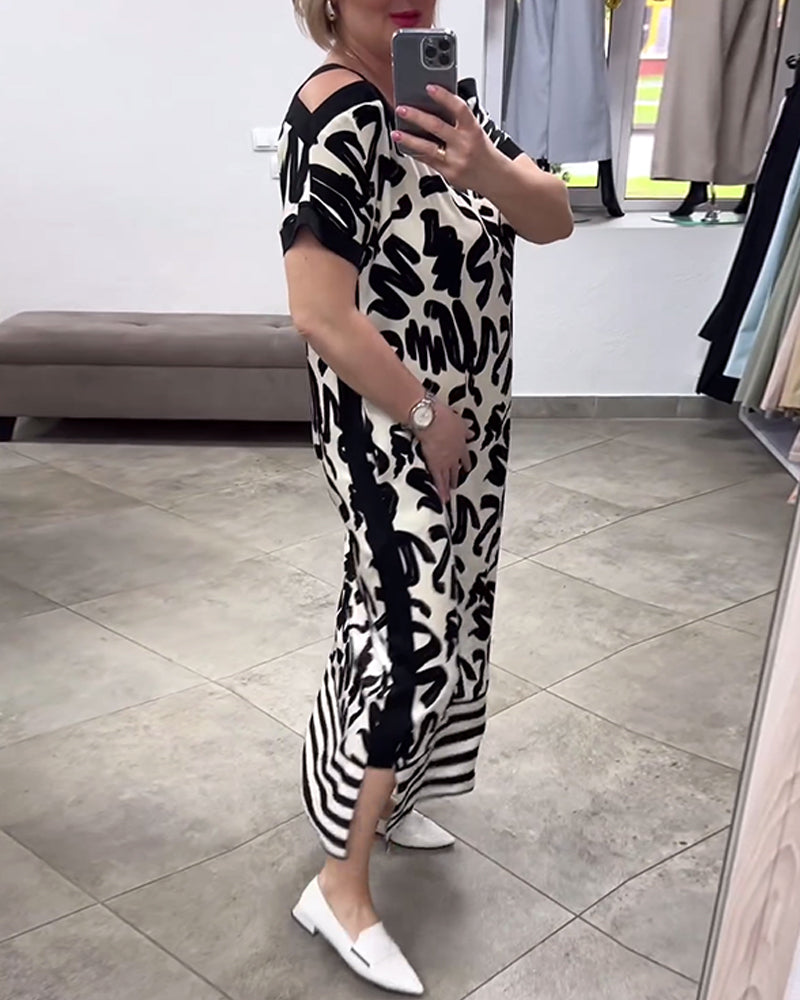 Kortärmad off-the-shoulder klänning med tryck