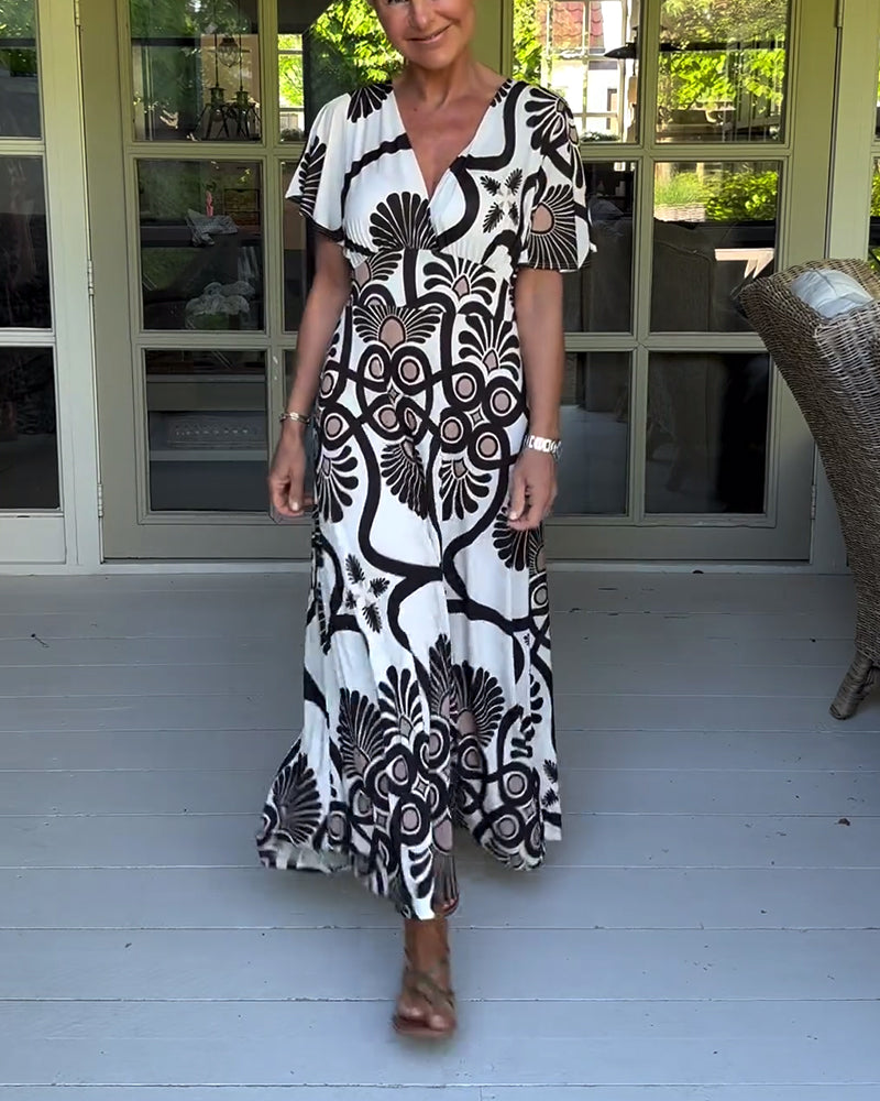 Kortärmad klänning med vintagetryck