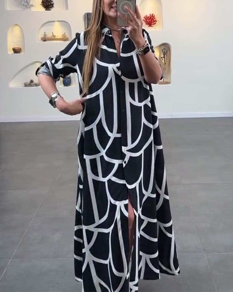 Lång slitsad klänning med kontrasttryck