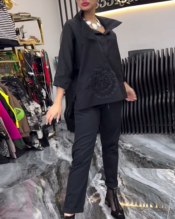 Lapelblom i spets med lapptäcke