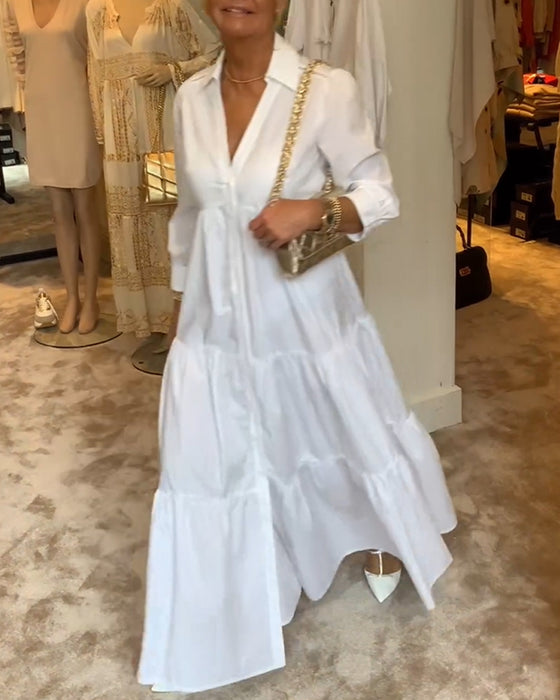 Klänning med knappar och slag