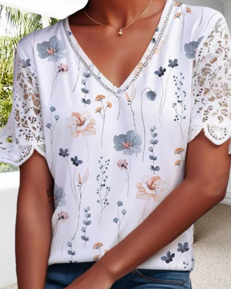 Blus med lace-patch och tryck