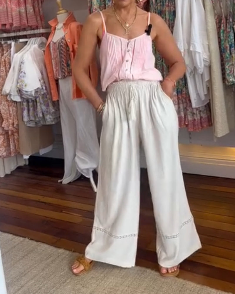 Enfärgade bekväma byxor med vida ben med fickor