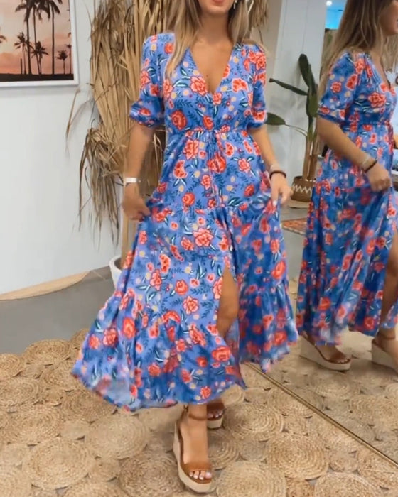 Klänning med rosentryck och slitsar