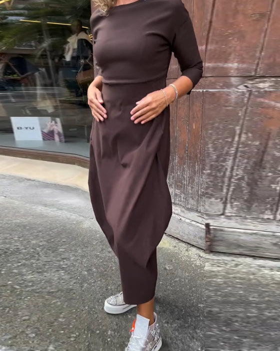 Enkel långärmad klänning i enfärgad ficka