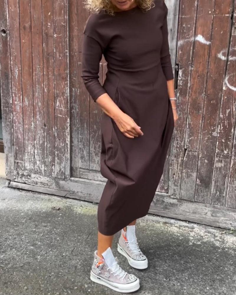 Enkel långärmad klänning i enfärgad ficka