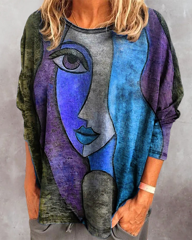 Långärmad topp med ansiktstryck