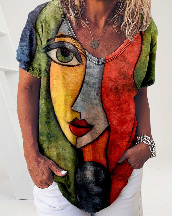 Kortärmad T-shirt med abstrakt ansiktstryck