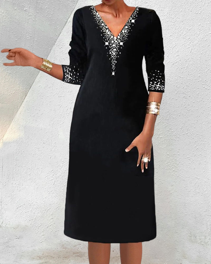 Långärmad klänning med tryck