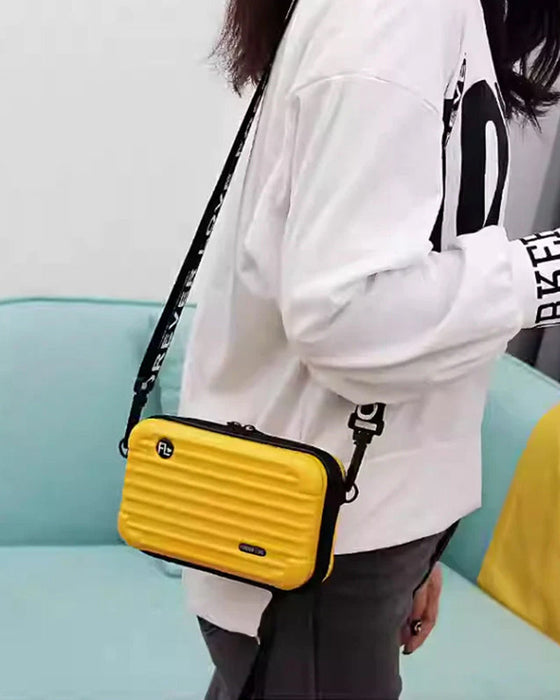 Miniatyrresväska som korsväska