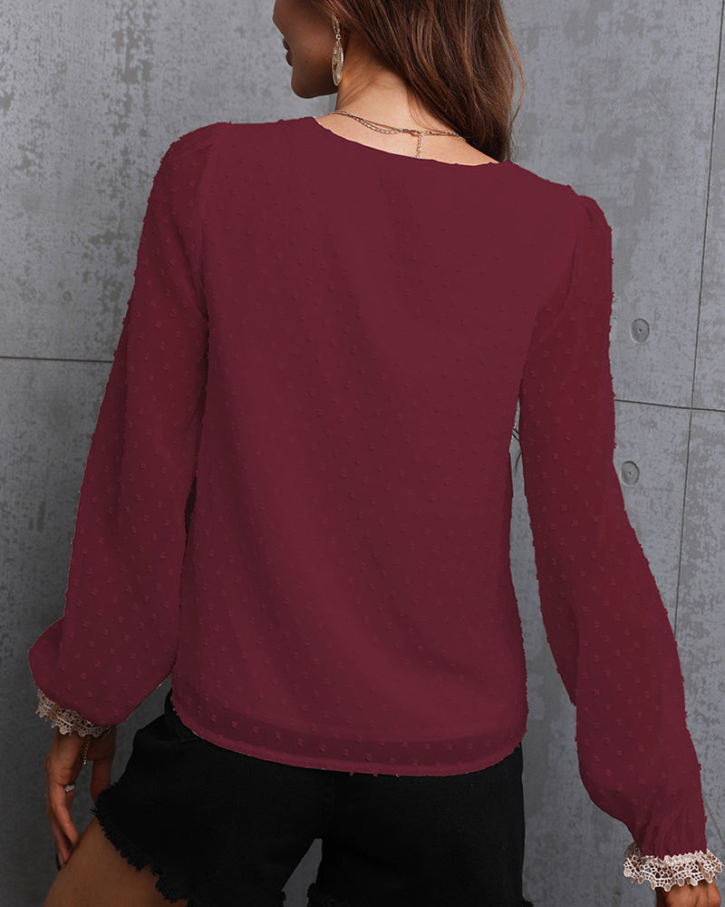 Enfärgad långärmad blusar med spets
